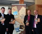 The Revd Robert Miller, Archbishop Michael Jackson, Bishop Ken Good and the Revd Earl Storey at launch of ‘The Extra Mile’ on the second day of the Church of Ireland General Synod in Armagh. The guide is designed to help churches find new and imaginative ways to serve practical needs in their local community. 'The Extra Mile' is available free of charge on www.derry.anglican.org. Photo: David Wynne.