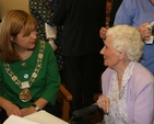 The Lord Mayor of Dublin, Cllr Emer Costello chatting with Olive Vaughan in the Brabazon House at Olive's 100th birthday party.