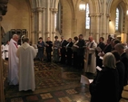 The Archbishop of Dublin, the Most Revd Dr John Neill (left) commissioning fourteen parish readers at the Chrism Eucharist Service in Christ Church Cathedral.
