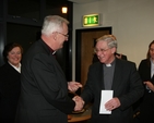 The Archbishop of Dublin, the Most Revd Dr John Neill making a presentation to the Revd Canon John McCullagh at a reception in his honour in recognition of his work as General Synod Education officer (Republic of Ireland) which he left recently to become Rector of Rathdrum.