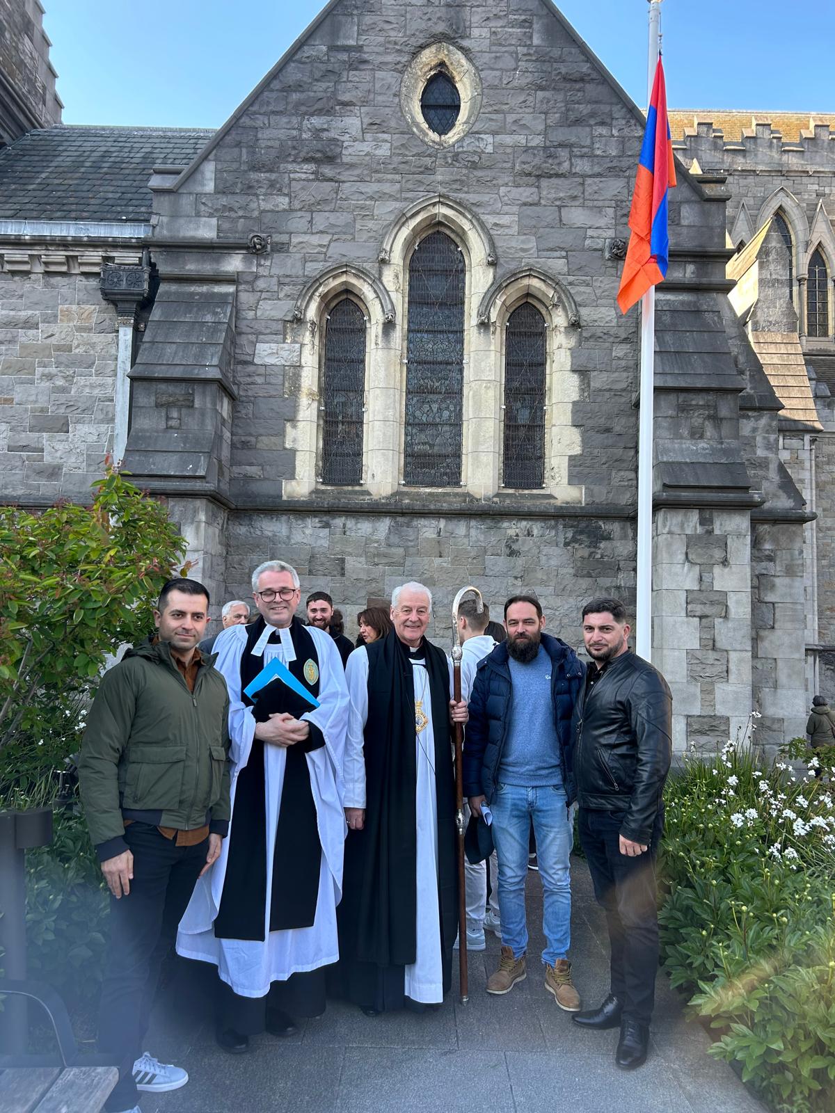 Members of the Armenian community including the sculptor who carved the Khachkar, Arta Hambarzumyan, following the commemoration service.