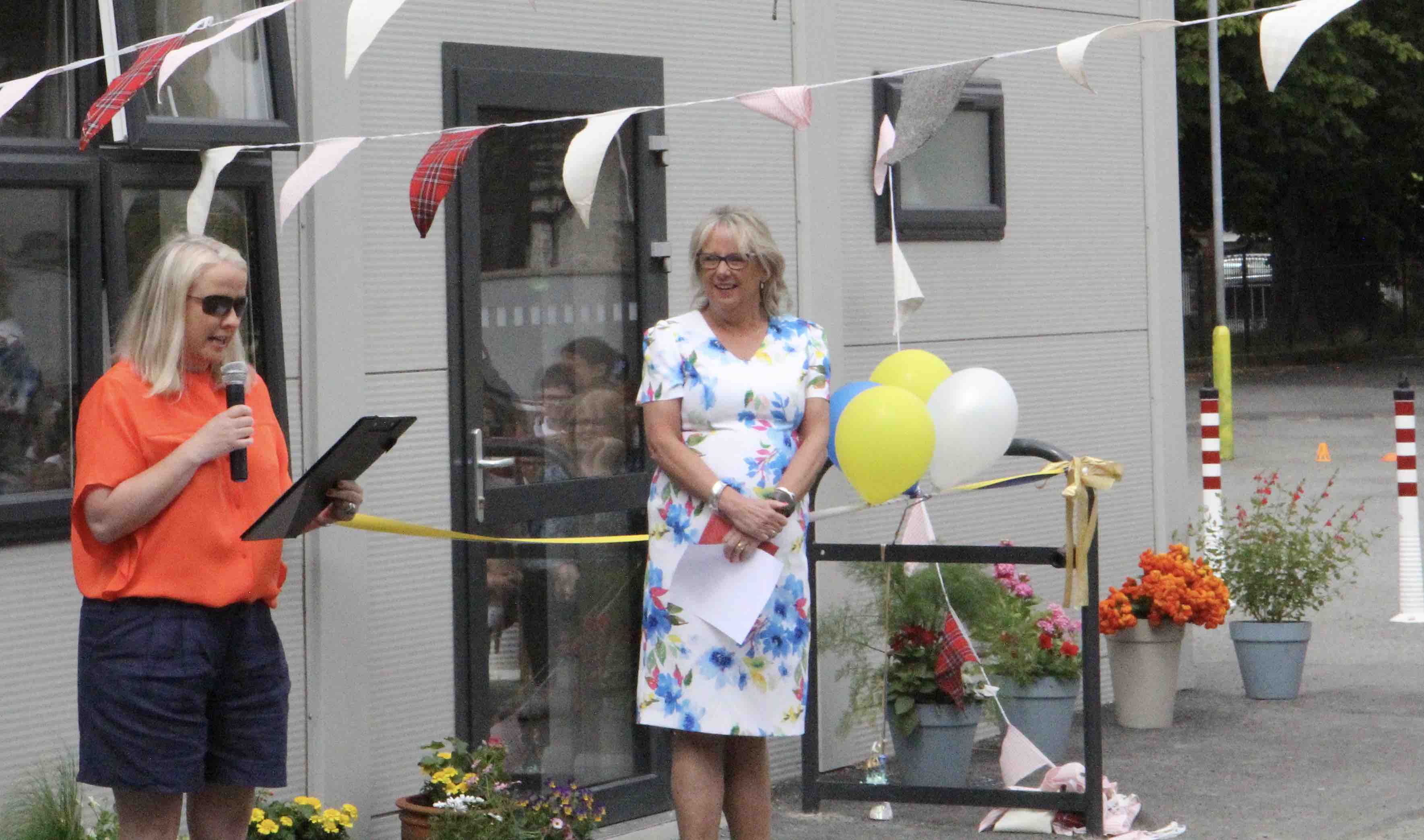 Jeannette Mee, chairperson of the building committee and Principal Hilary McBain.