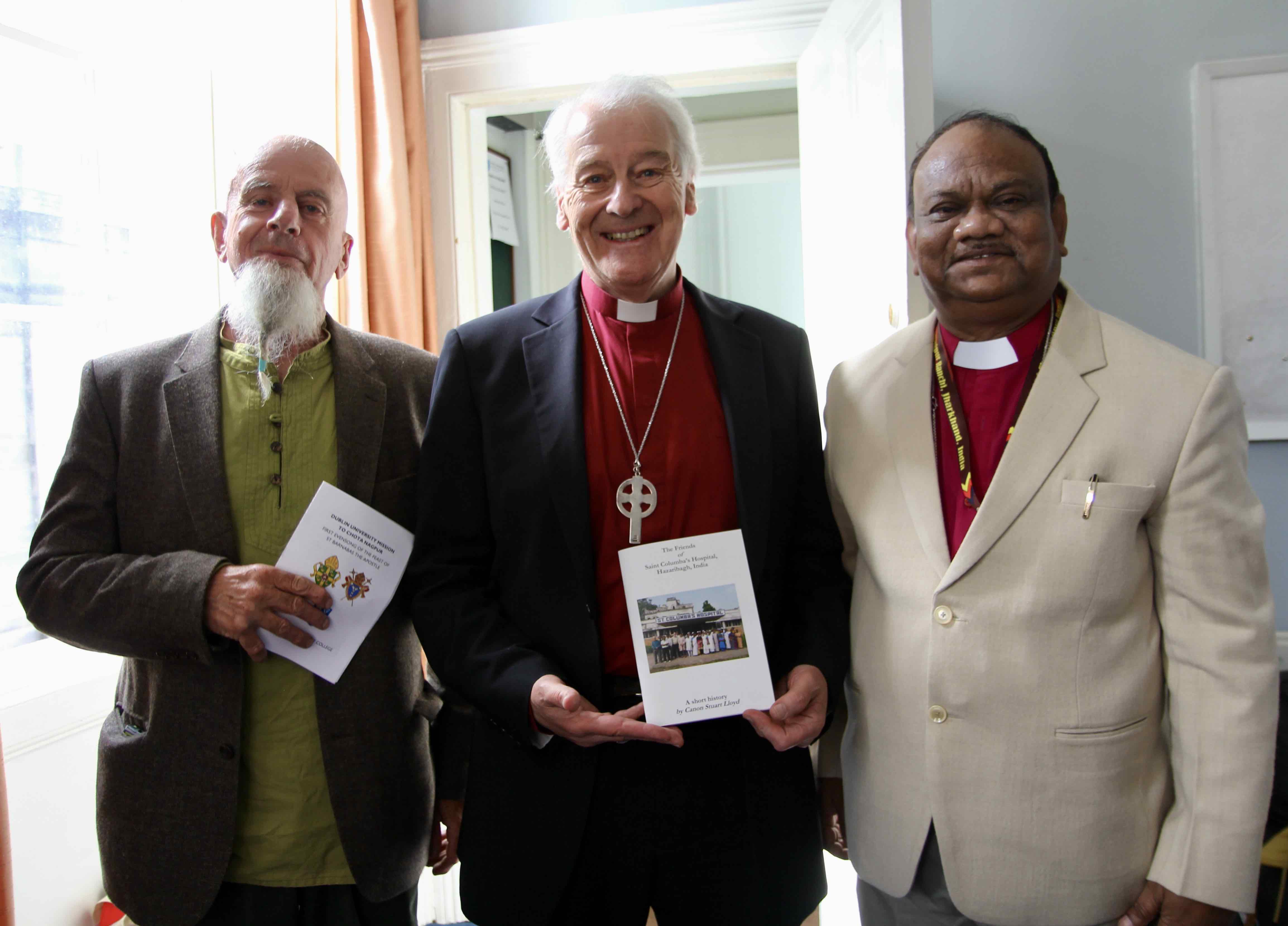 Ian McKay representing Canon Stuart Lloyd, author of the book on St Columba's Hospital, with Archbishop Michael Jackson and Bishop Basil Baskey.