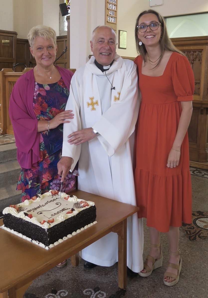 Canon Leonard Ruddock with Hazel and Amanda.