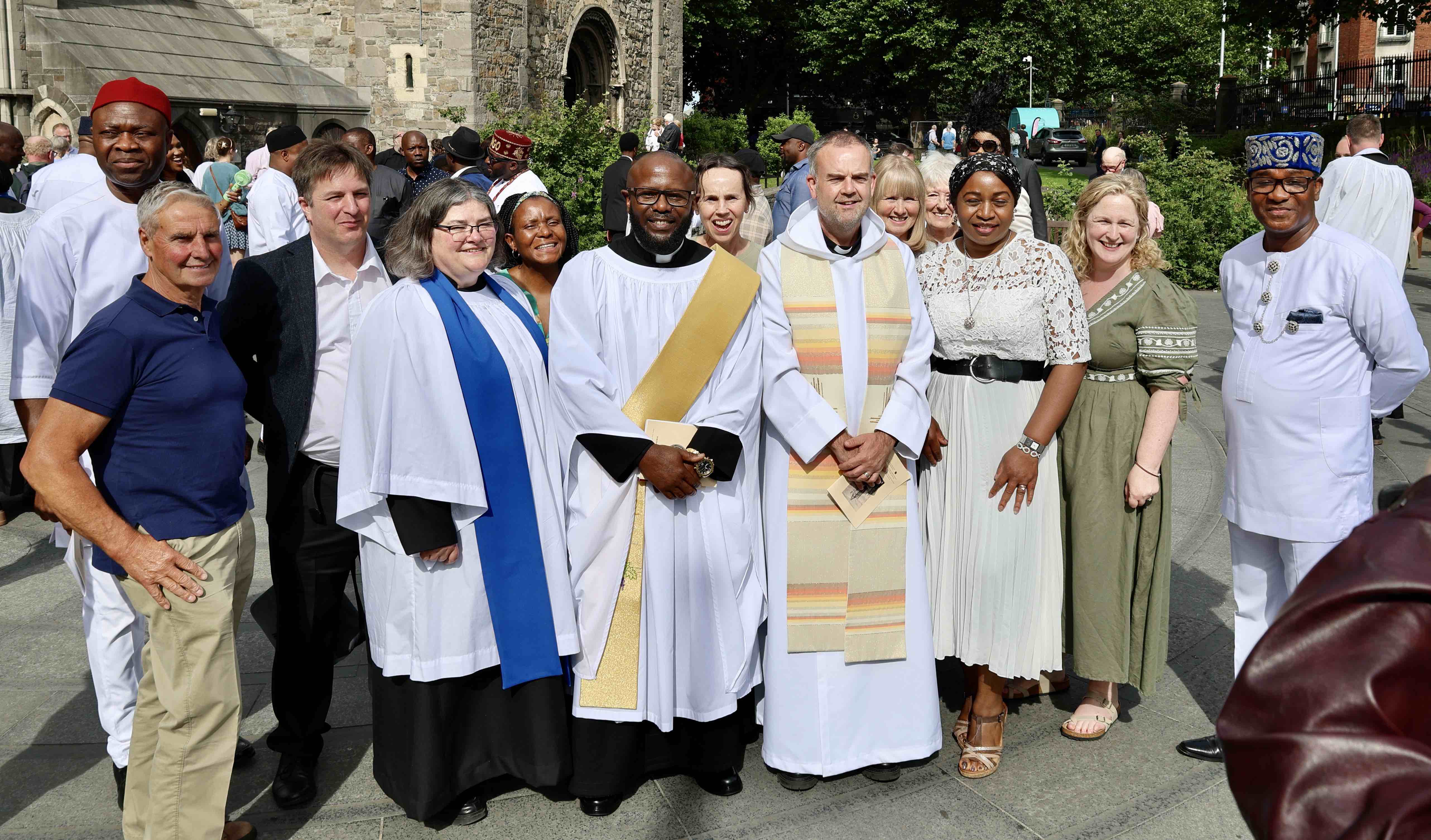 The Revd Cennis Chikezie with the Revd Colin McConaghie and a group of Castleknock parishioners.