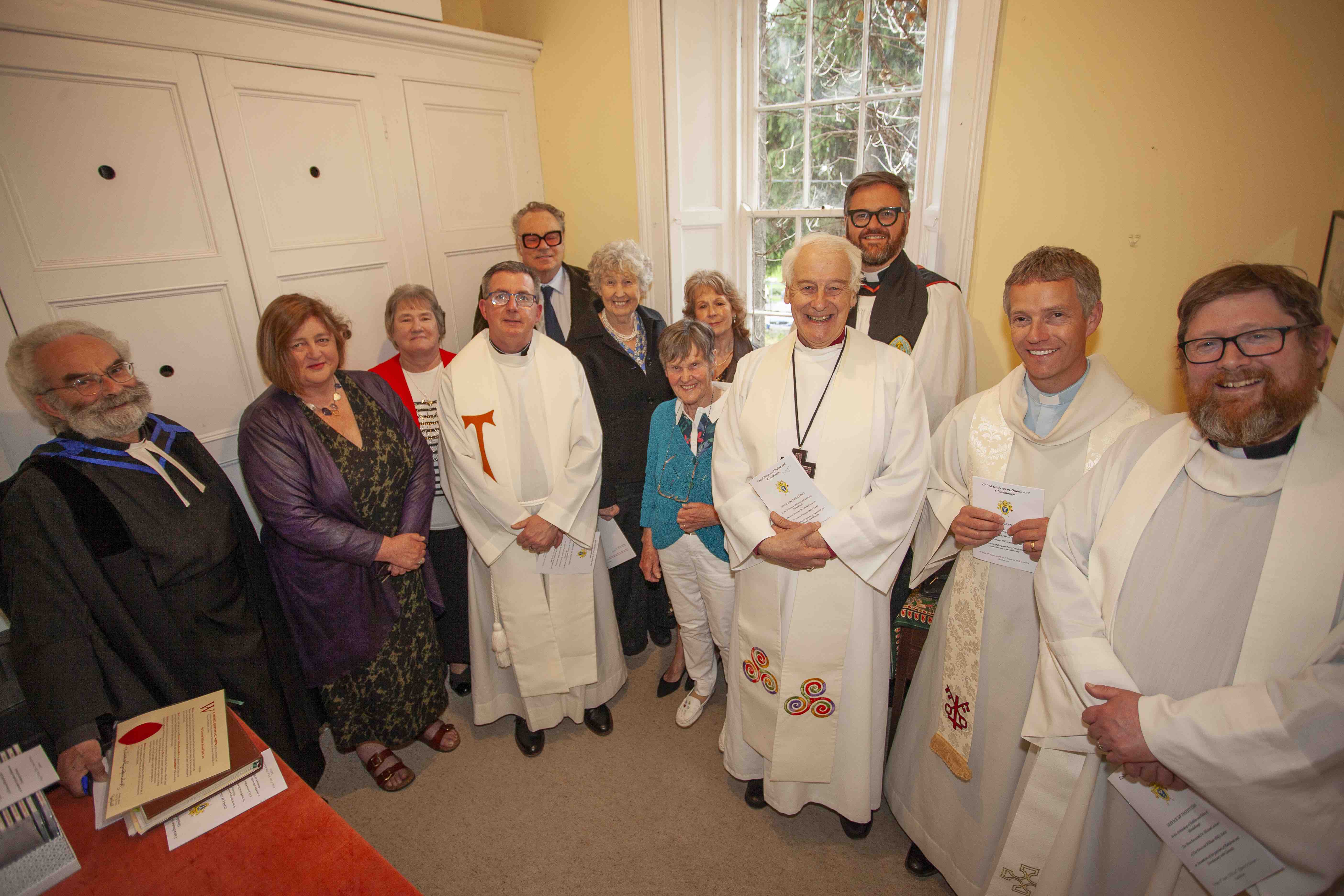 The Revd Billy Burke with Archbishop Michael Jackson, Church Wardens of Rathdrum and Derralossary with Glenealy and clergy.
