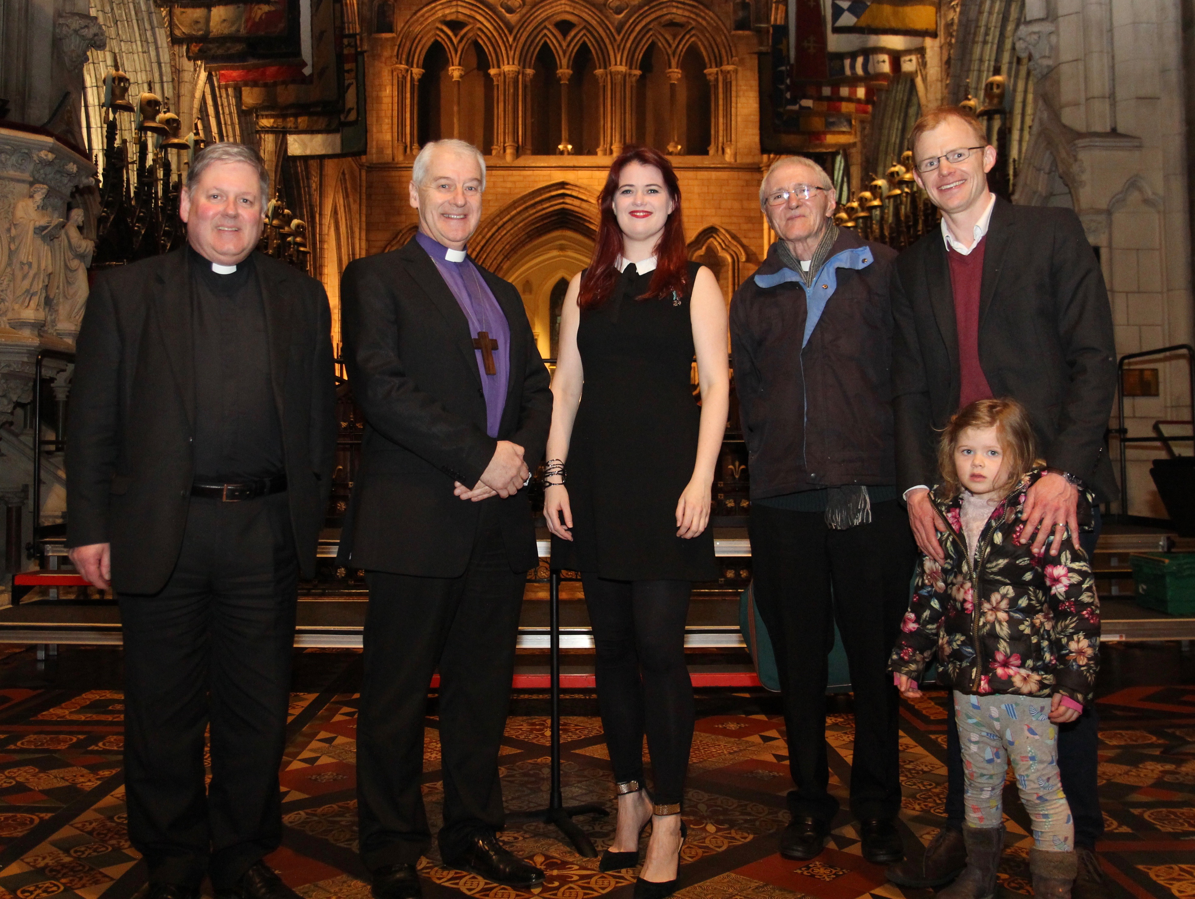 Dean William Morton, Archbishop Michael Jackson, Suzanne Savage, Canon Horace McKinley and Nick Henderson, CEO of the Irish Refugee Council, with his daughter.