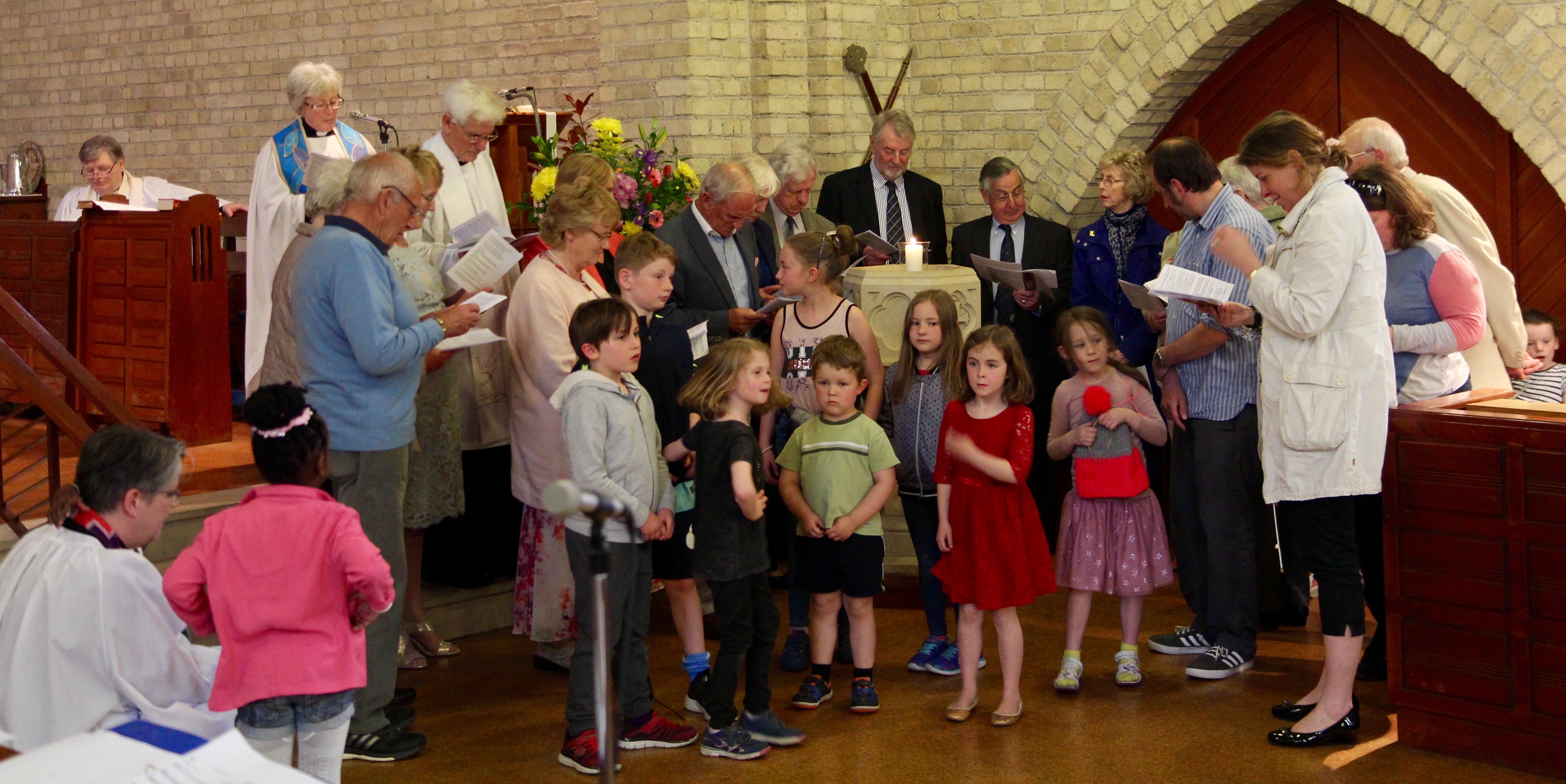 Some of the first people to be baptised in St Mary's, Crumlin, with some of the most recent children to be baptised renew their vows on the 75th anniversary of the church.