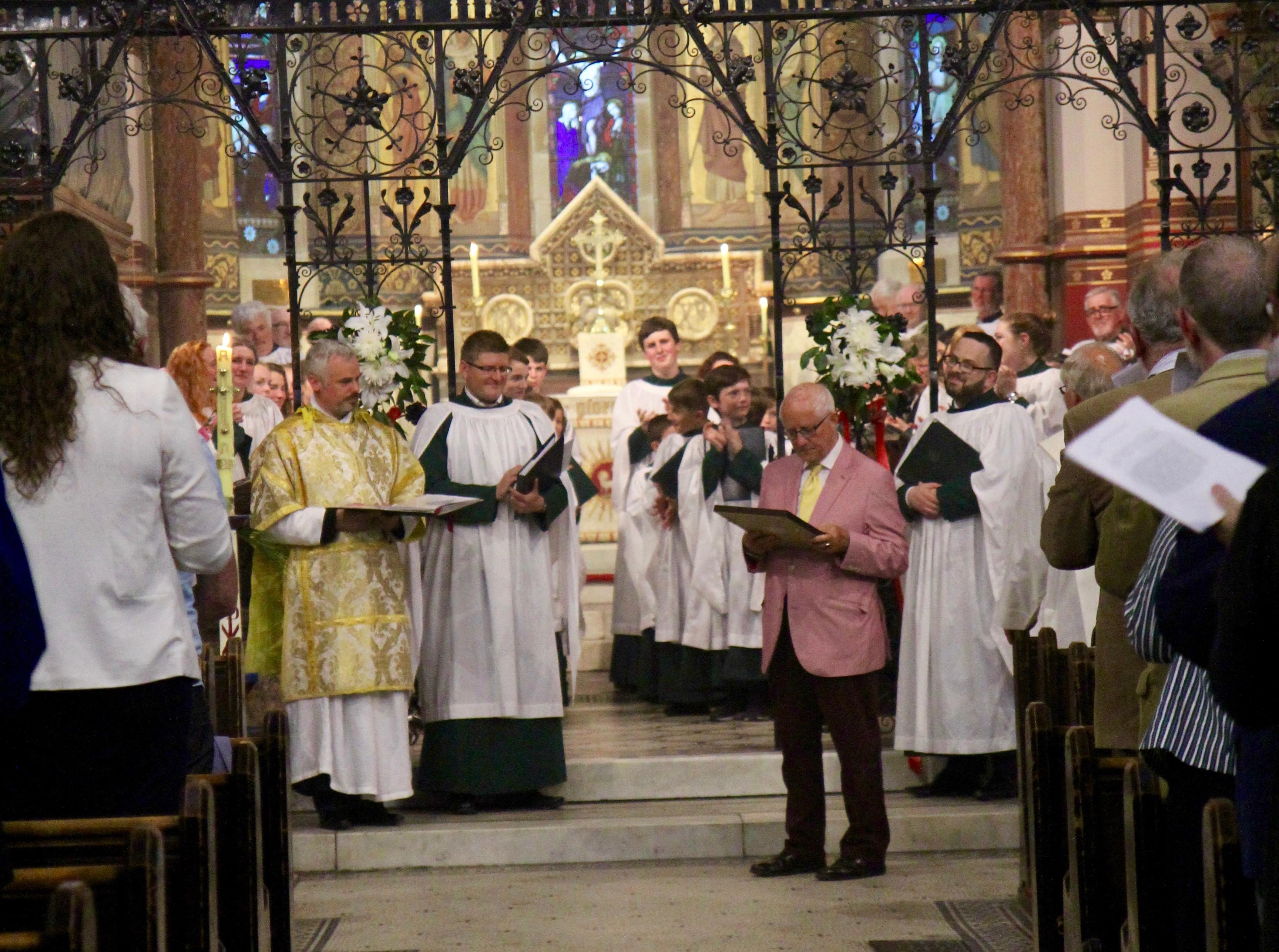 Long serving member of the choir, Bobby Barden, is presented with his certificate.