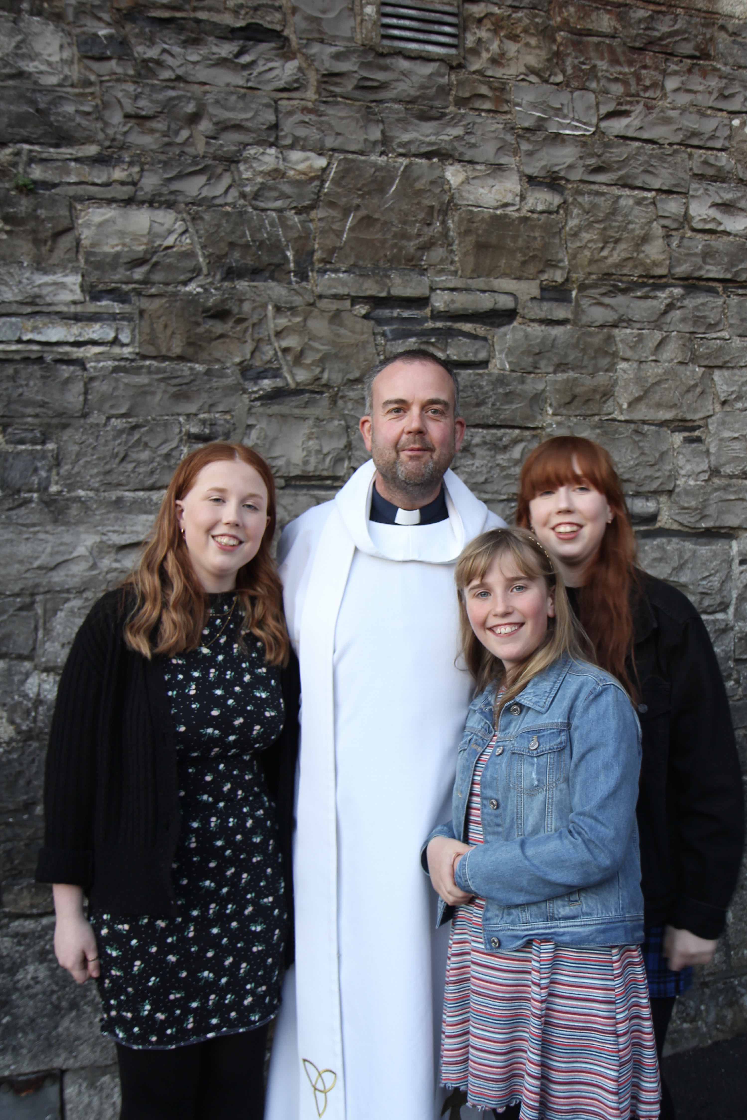 The Revd Colin McConaghie and his daughters.