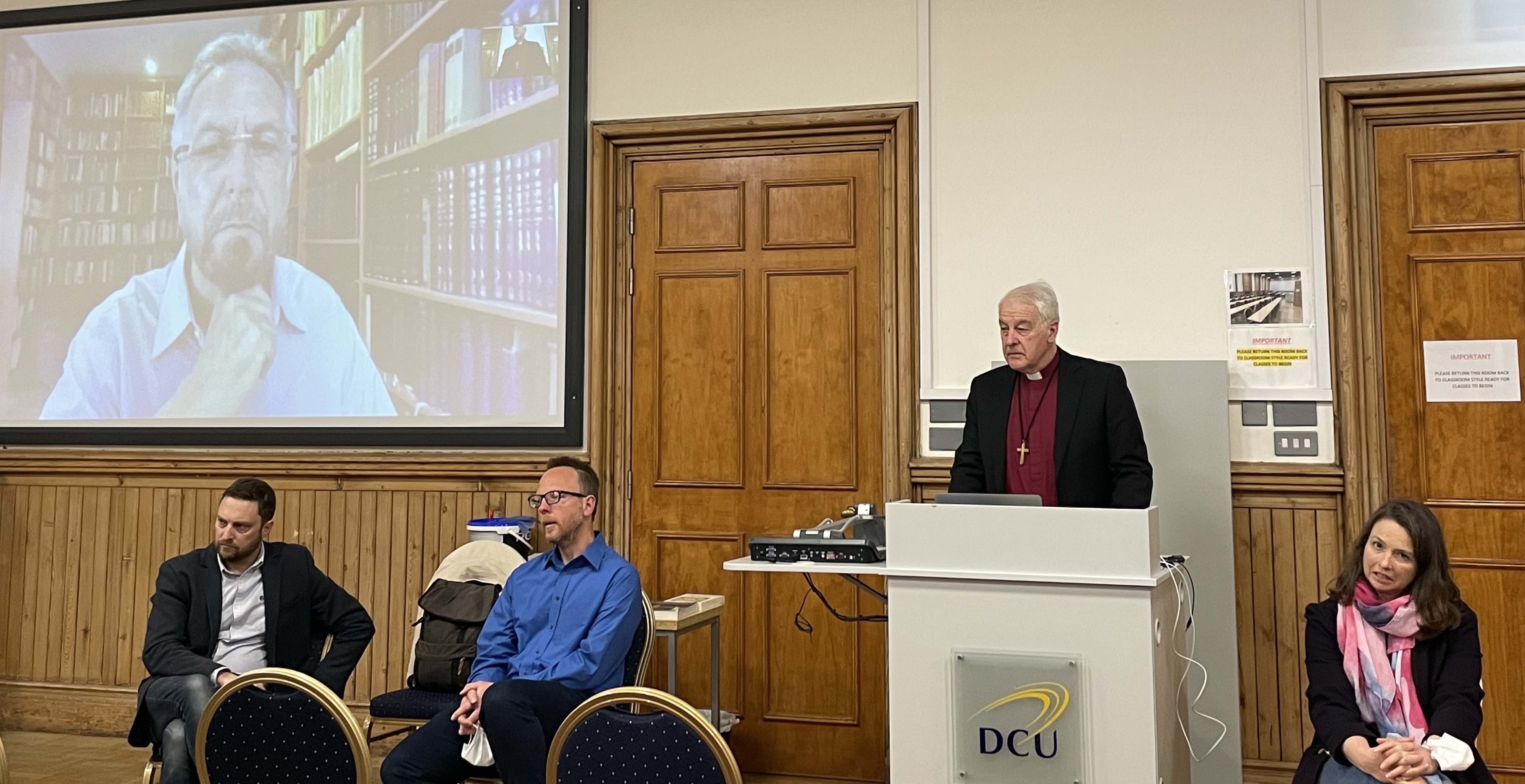 Rabbi David Rosen on screen, Dr Brad Anderson, Dr Peter Admirand, Archbishop Michael Jackson and Dr Katie Heffelfinger.