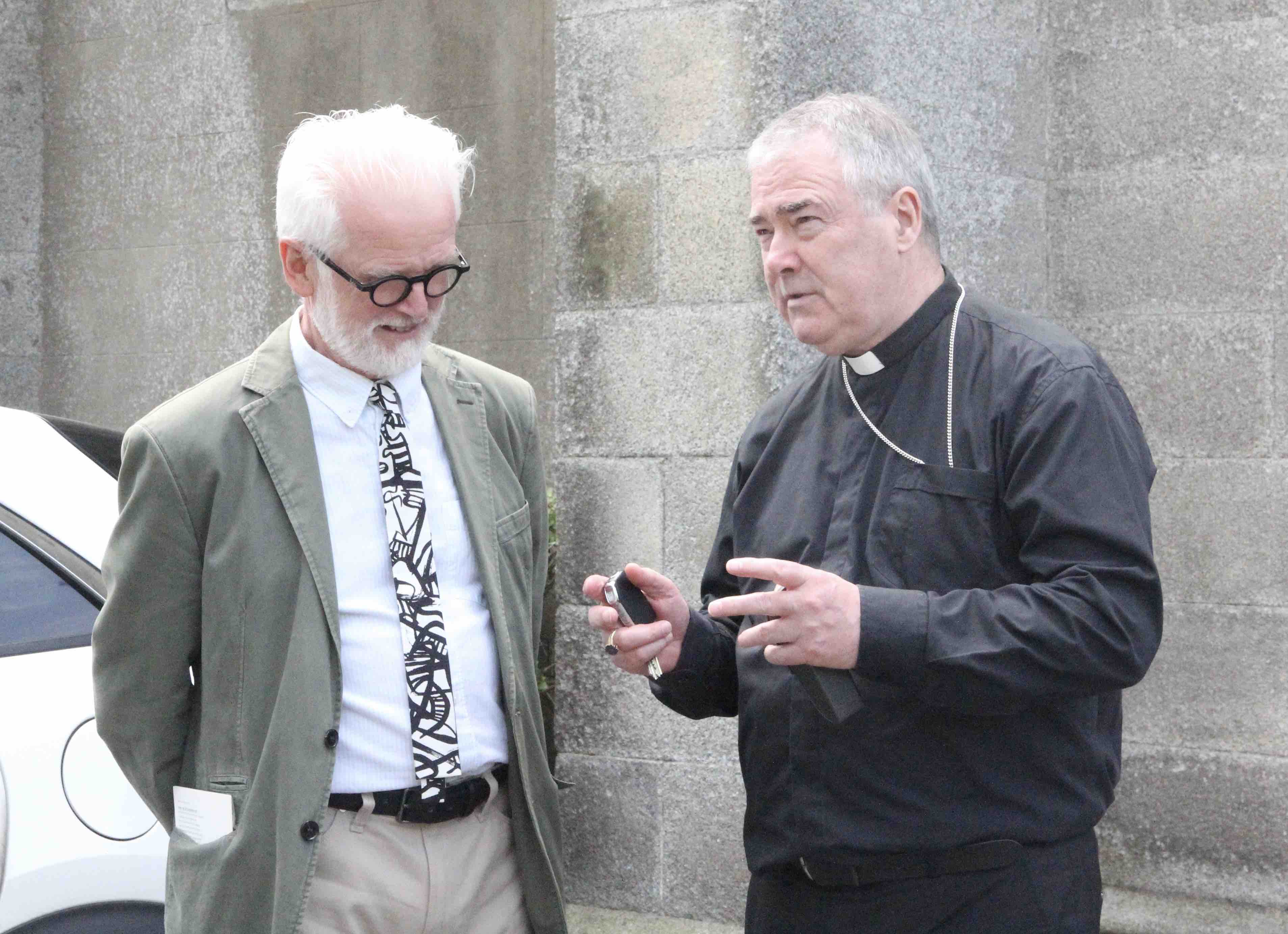 Archbishop John McDowell in conversation in Michael Lee, author of the parish history.