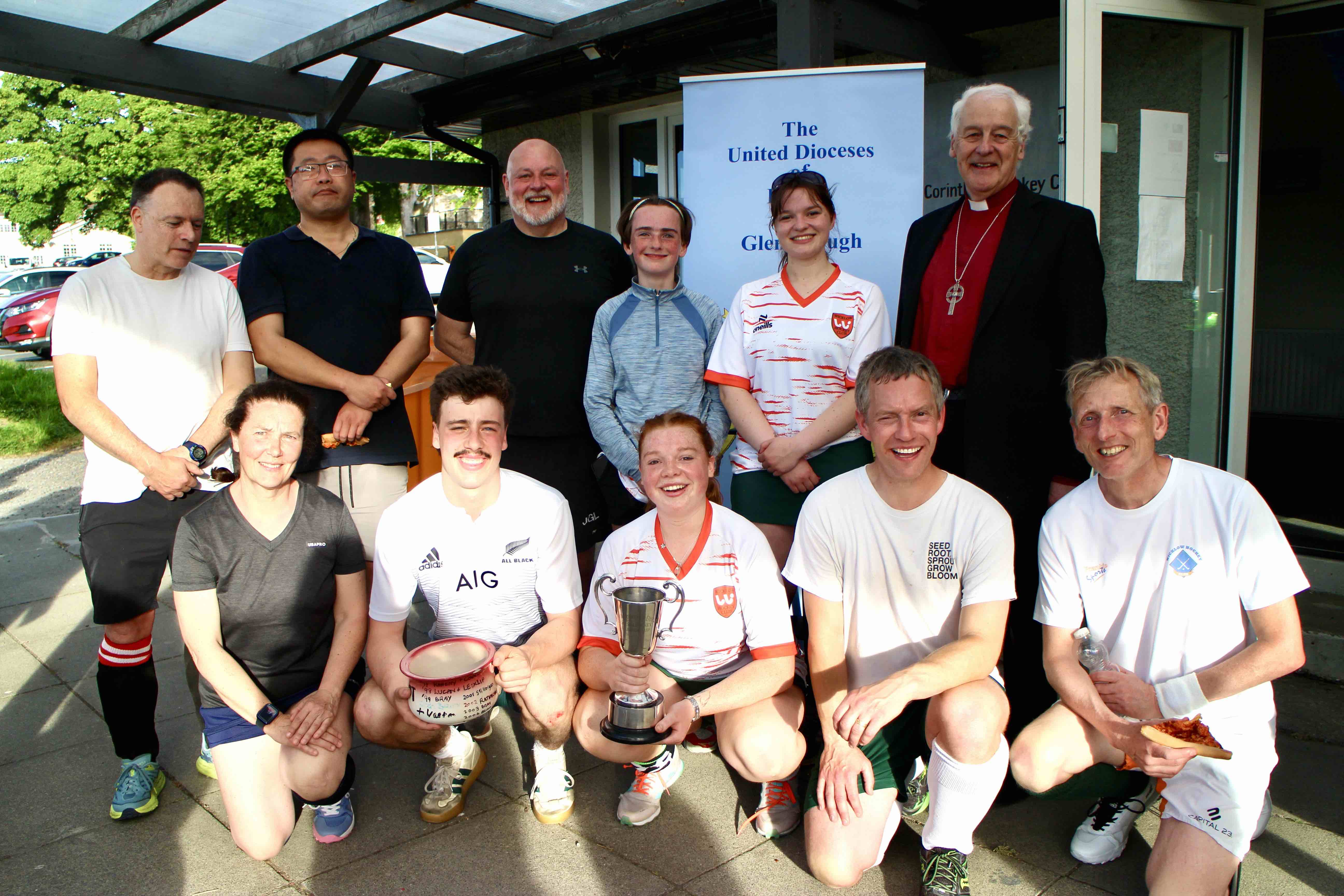 The victorious and vanquished Wicklow Parish hockey teams.