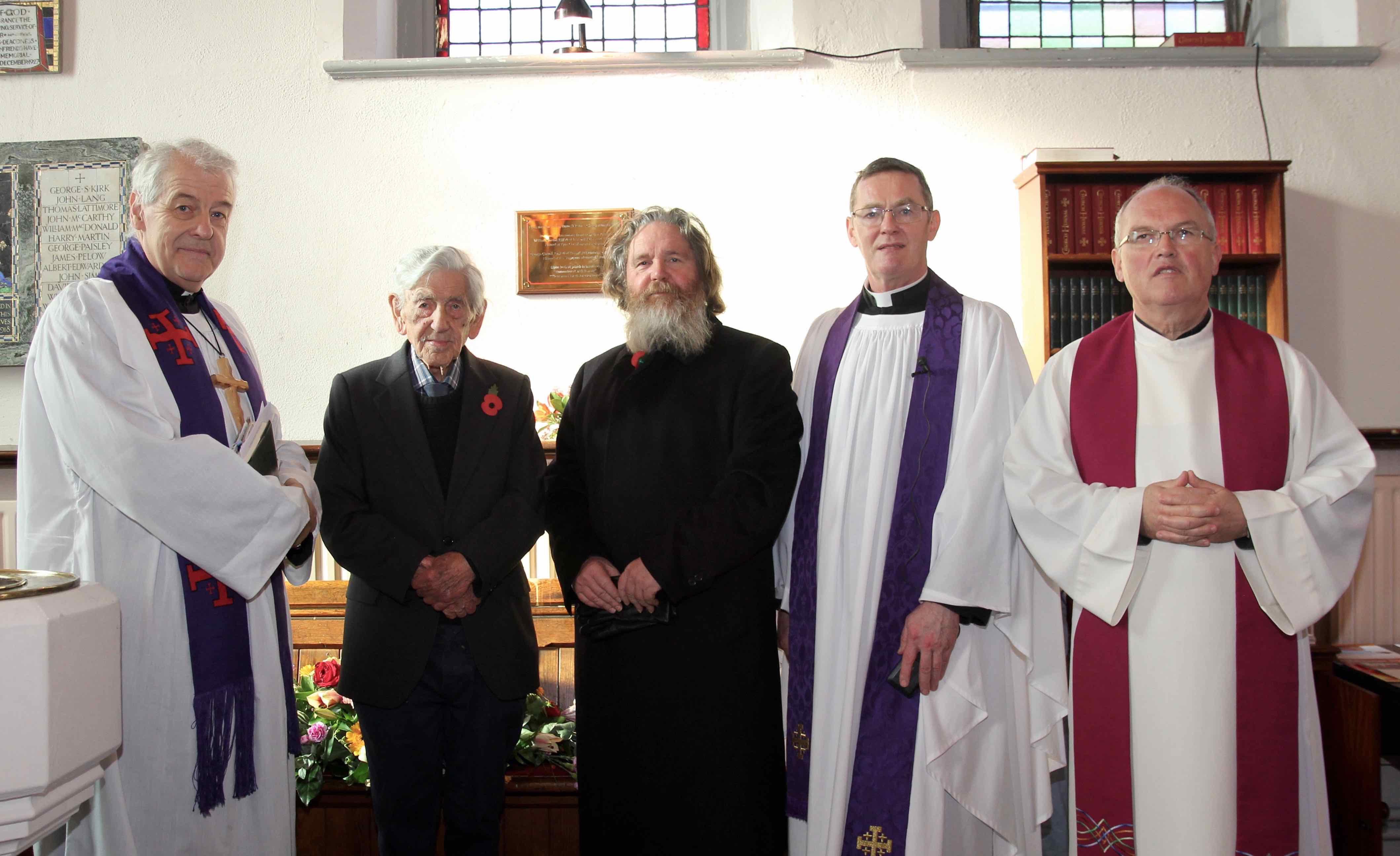 Archbishop Michael Jackson, Henry Carroll, Gordon Carroll, Canon Mark Gardner and Fr Alois Greiler at the newly dedicated Carroll family war memorial in the Church of St Catherine and St James.