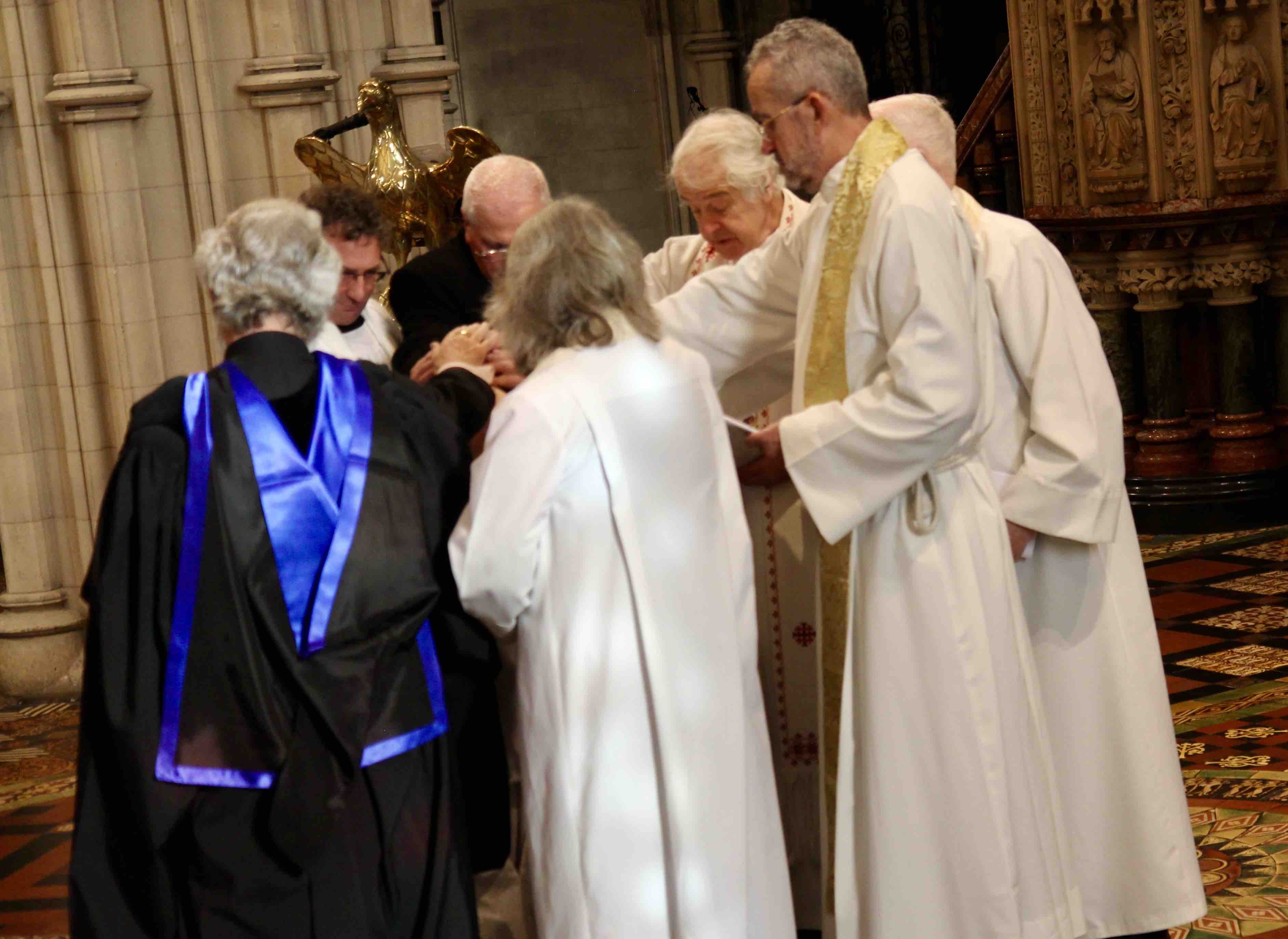 The laying on of hands.