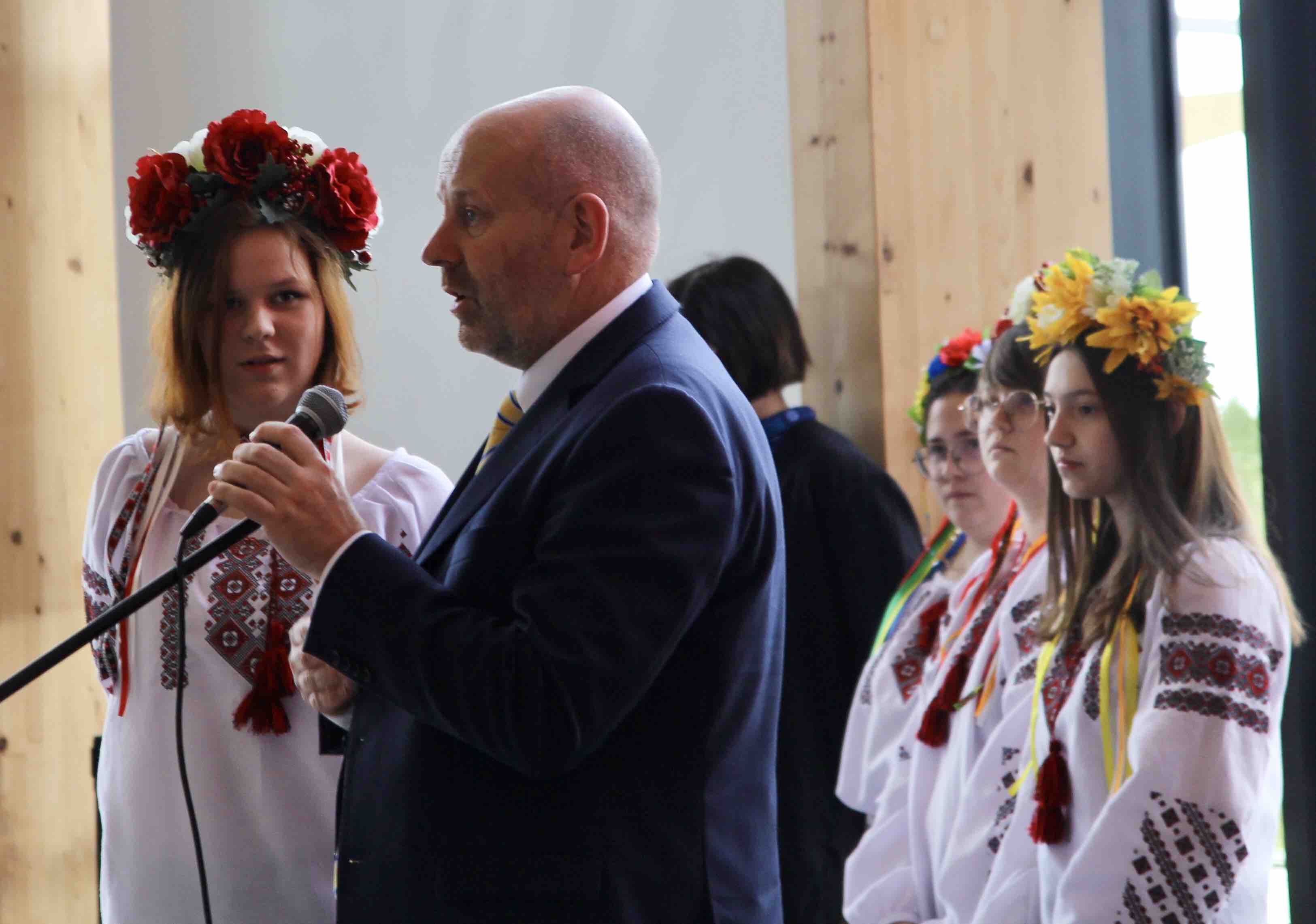 Eva Trachuk translating for school principal Alan Cox.