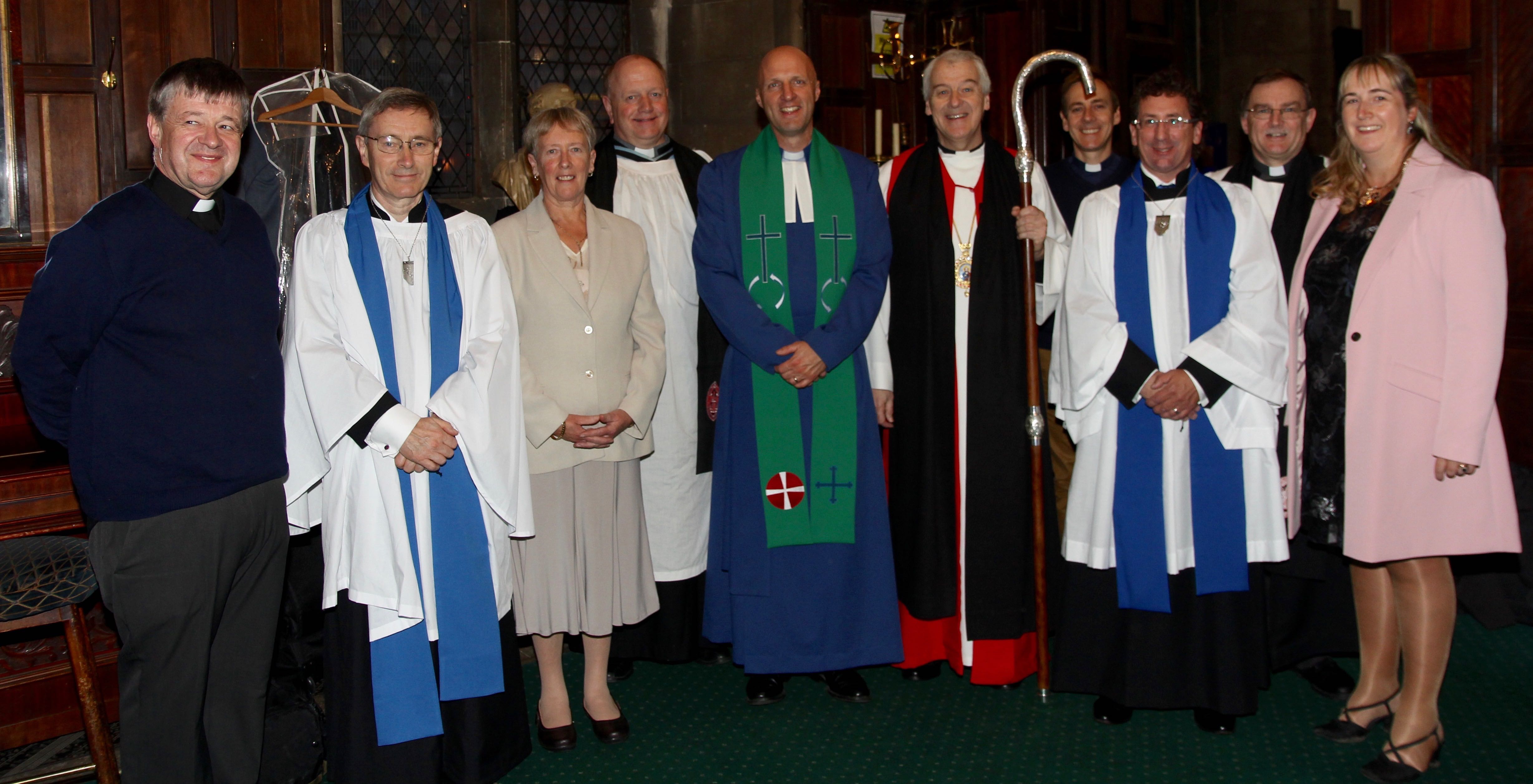 The newly commissioned Diocesan and Parish Readers and their Rectors with Archbishop Michael Jackosn and the Revd Dr Alistair Graham.