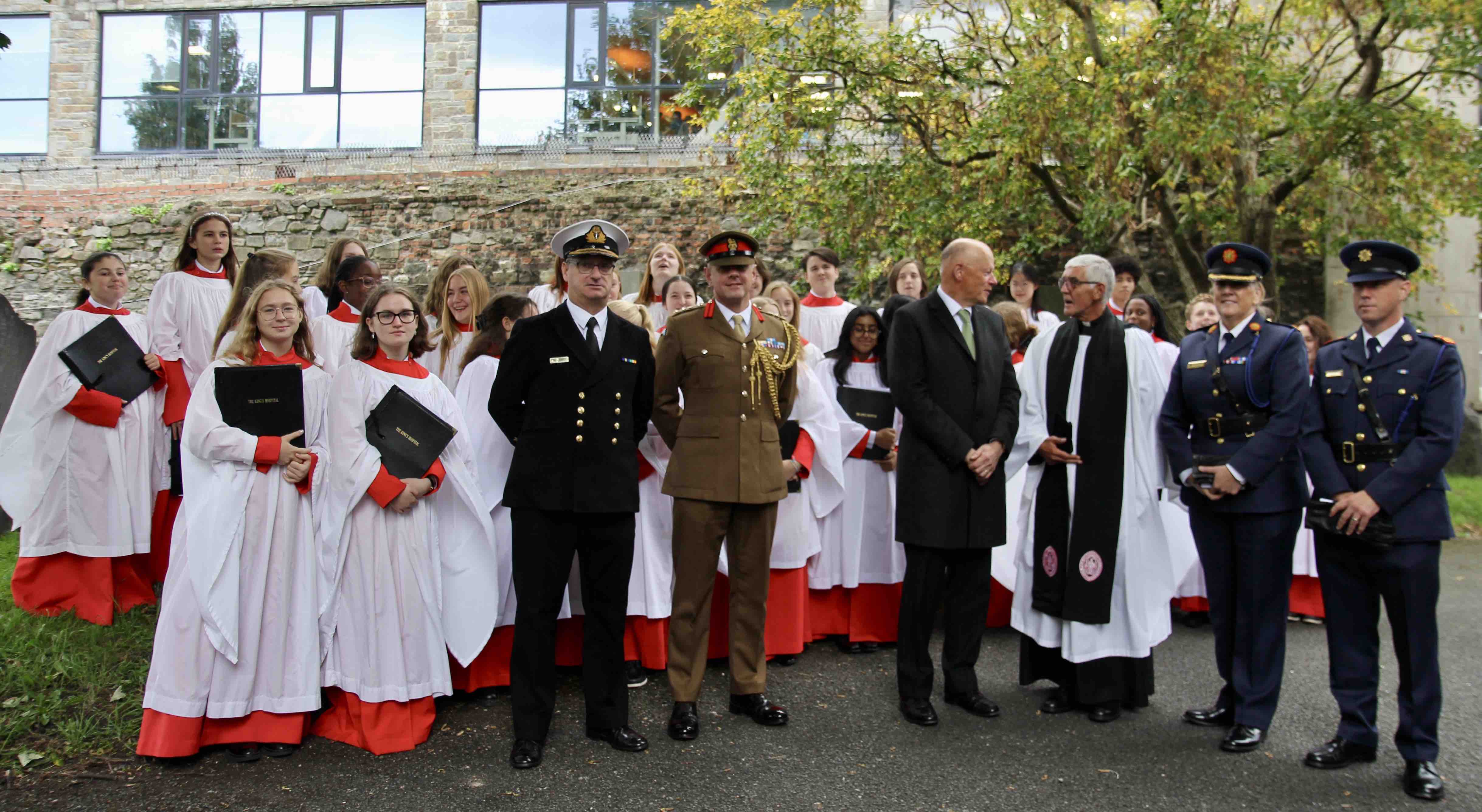 Archdeacon David Pierpoint chats to the Chief Justice Donal O'Donnell and Assistant Commissioner Paula Hillman with representatives of An Garda Siochana and the Defence Forces