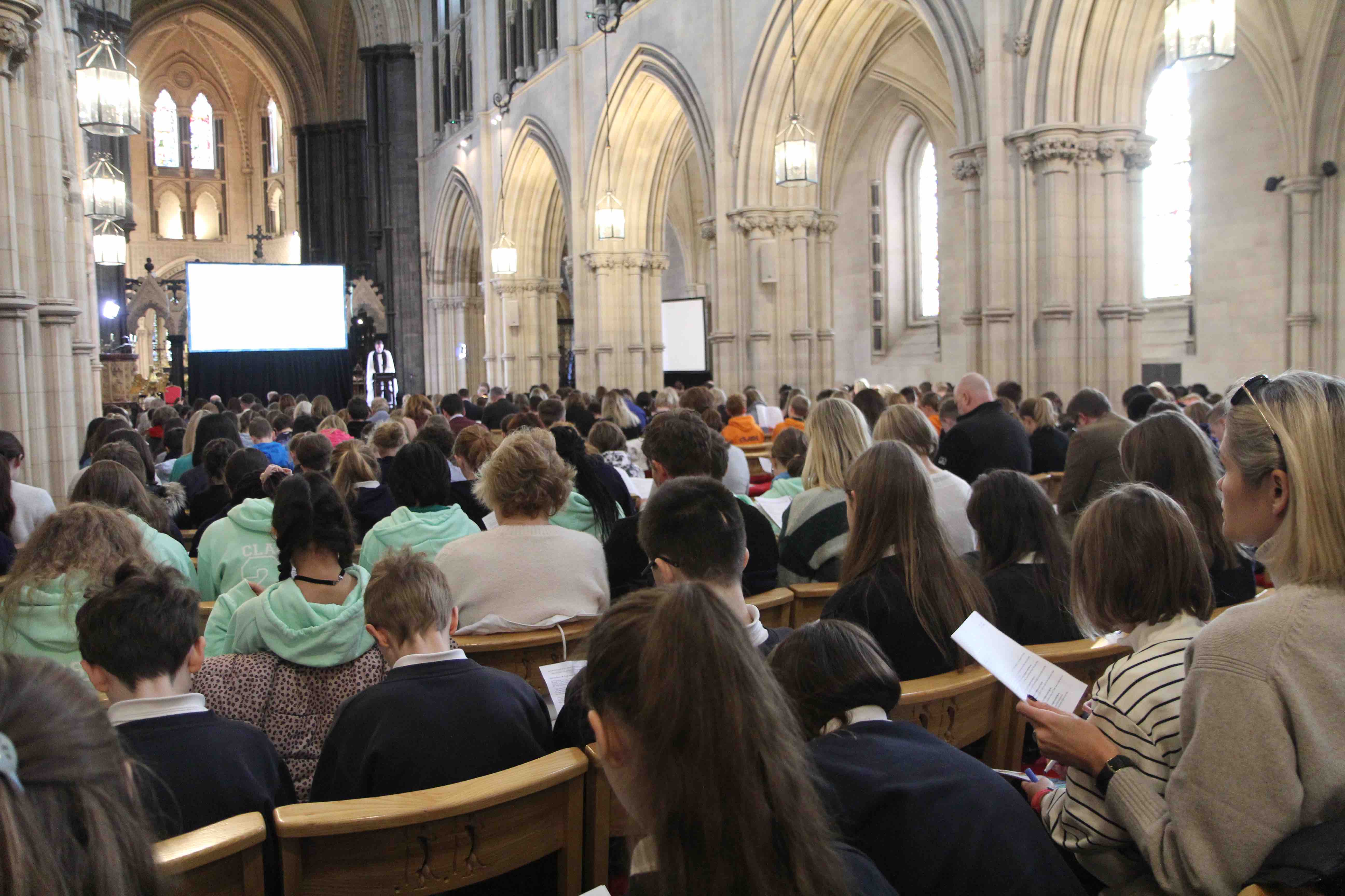 The Revd Sean Hanily greets the congregation.