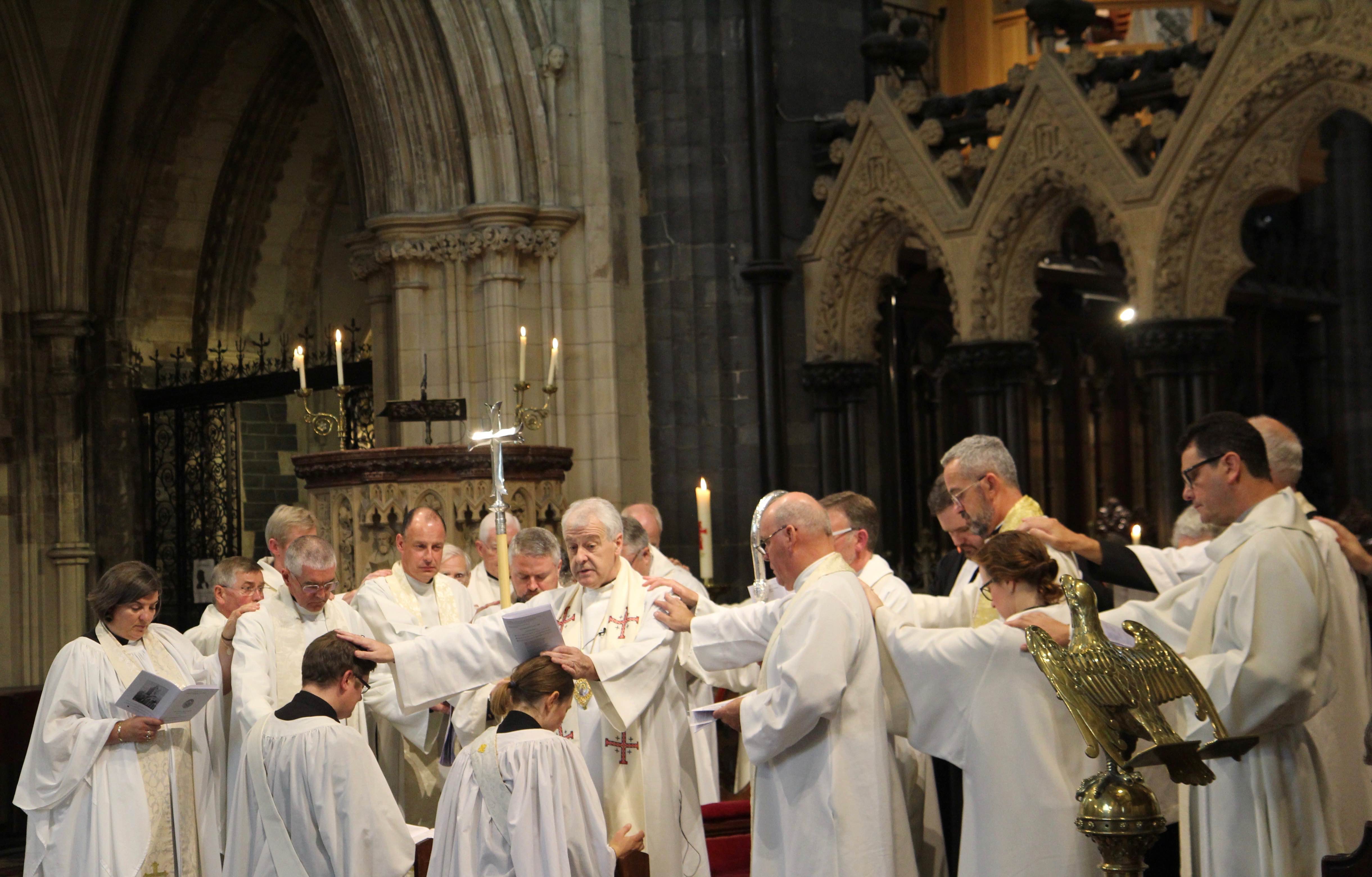 The Laying on of Hands during the Service of Ordination to the Priesthood of the Revd Rebecca Guildea and the Revd Ross Styles