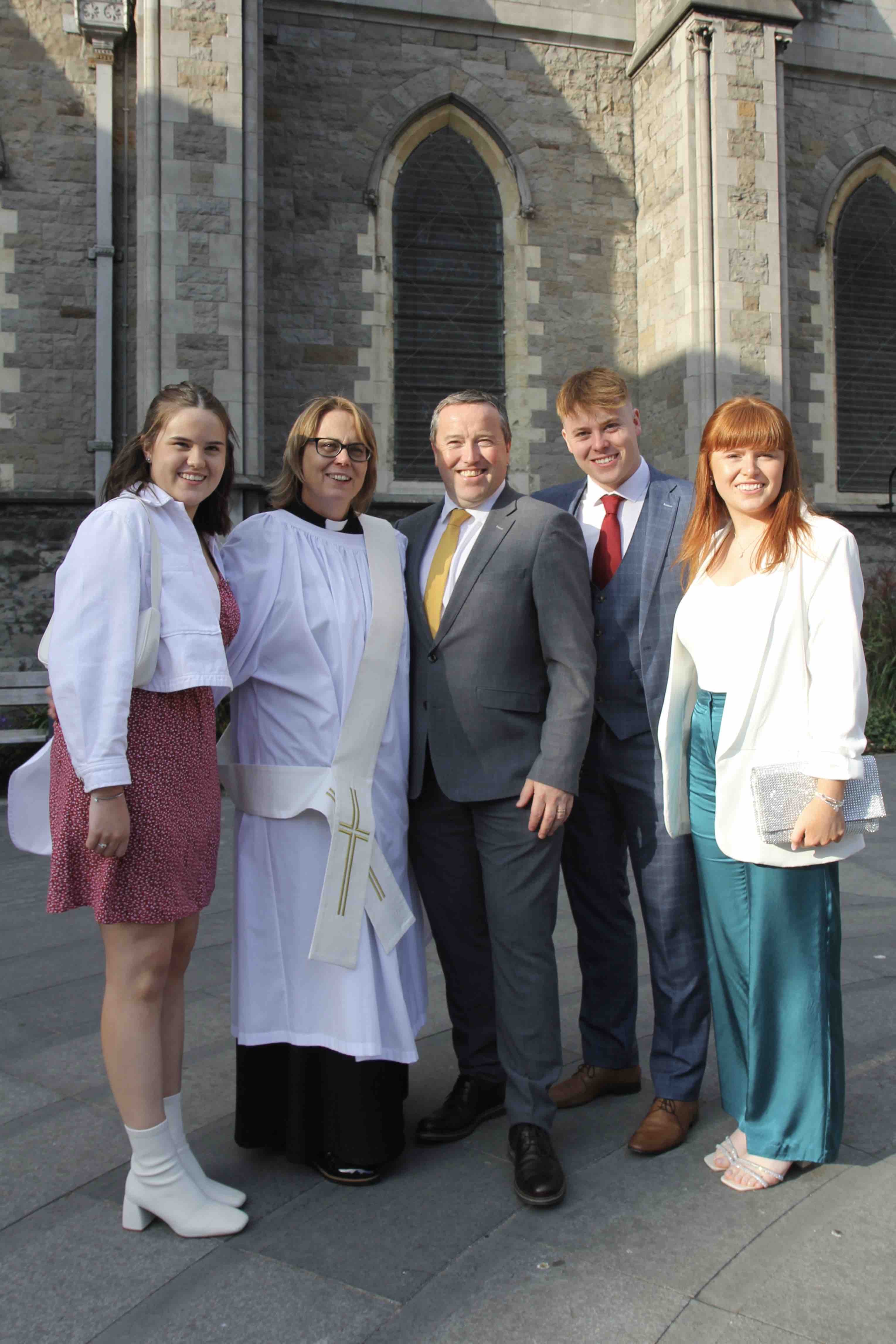 The Revd Jane Burns with her family after her ordination.