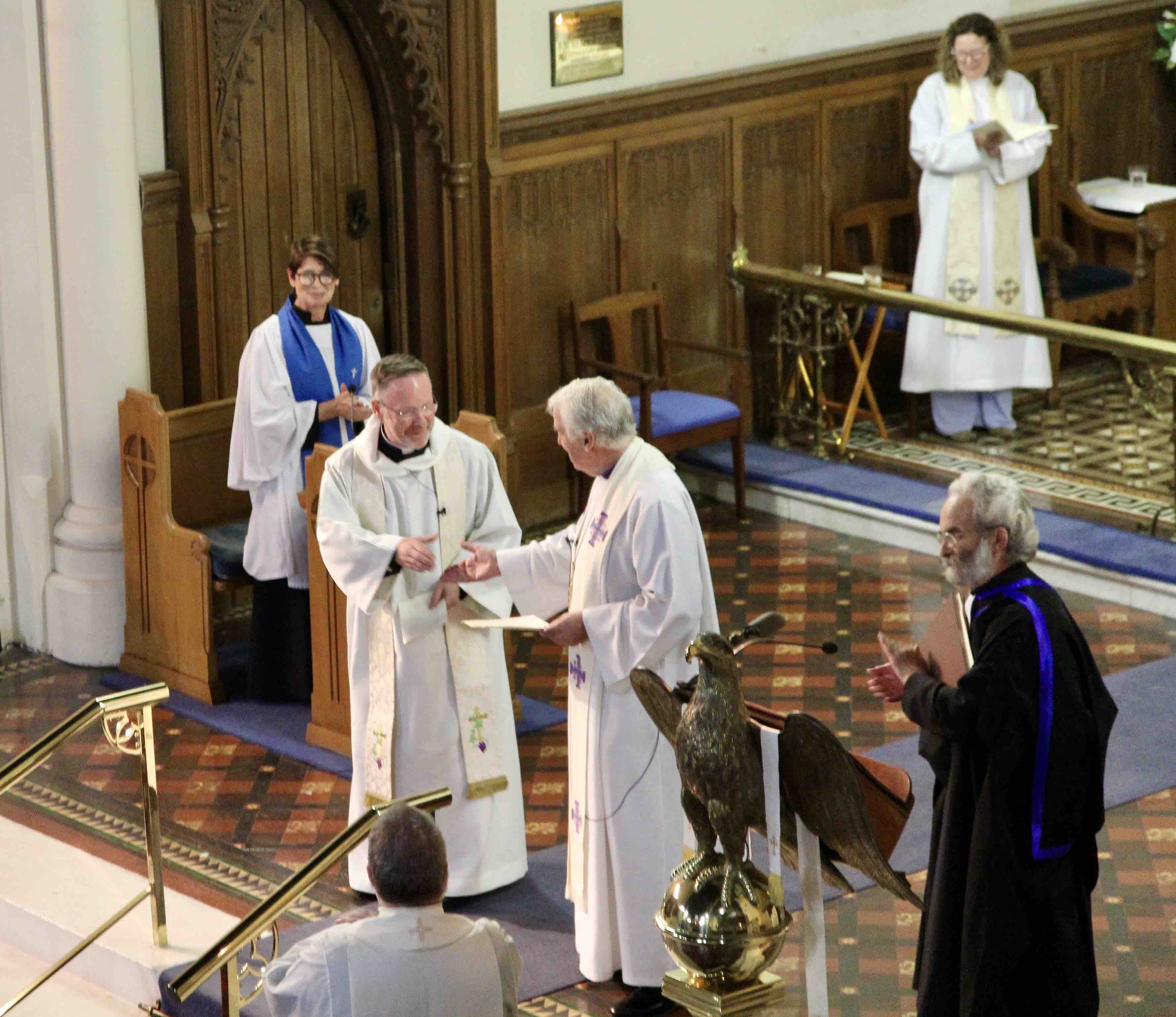 The Archbishop congratulates the new Rector of Zion.