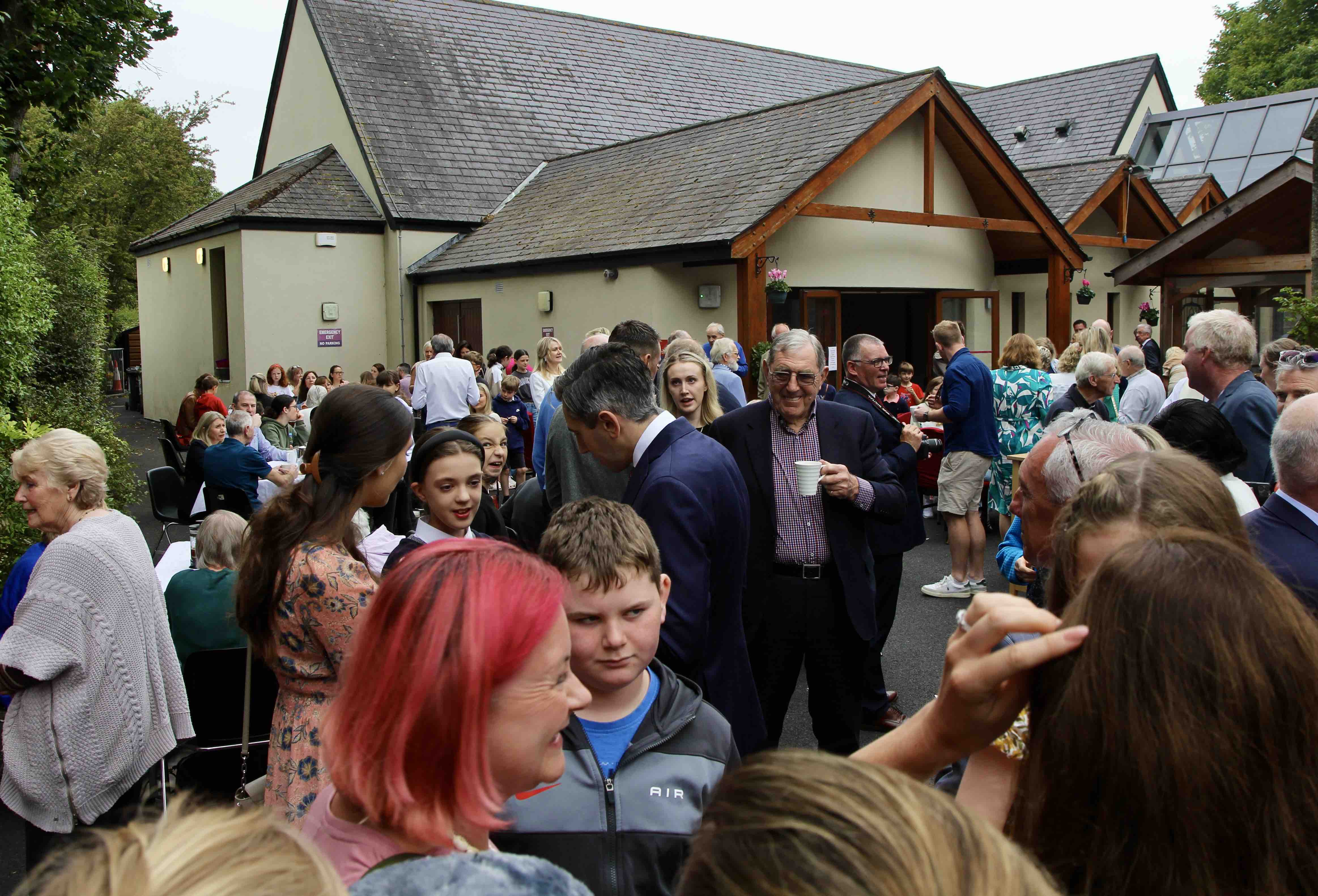 An Taoiseach Simon Harris meets members of the Temple Carrig Community and parishioners of St Patrick's Greystones after the service.