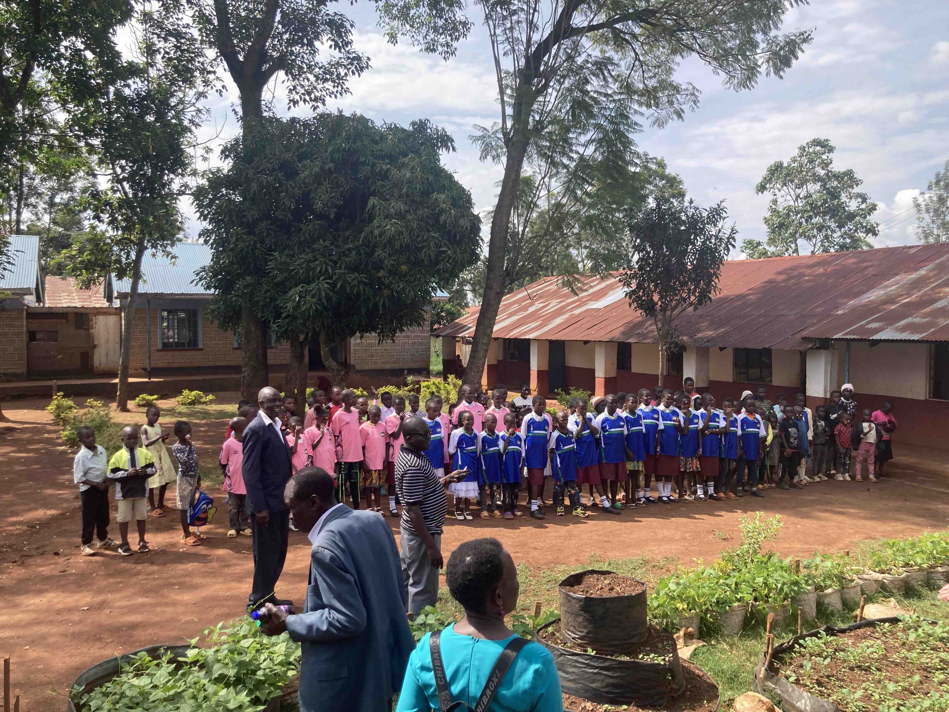 Children from Wandeche in their new school jerseys.