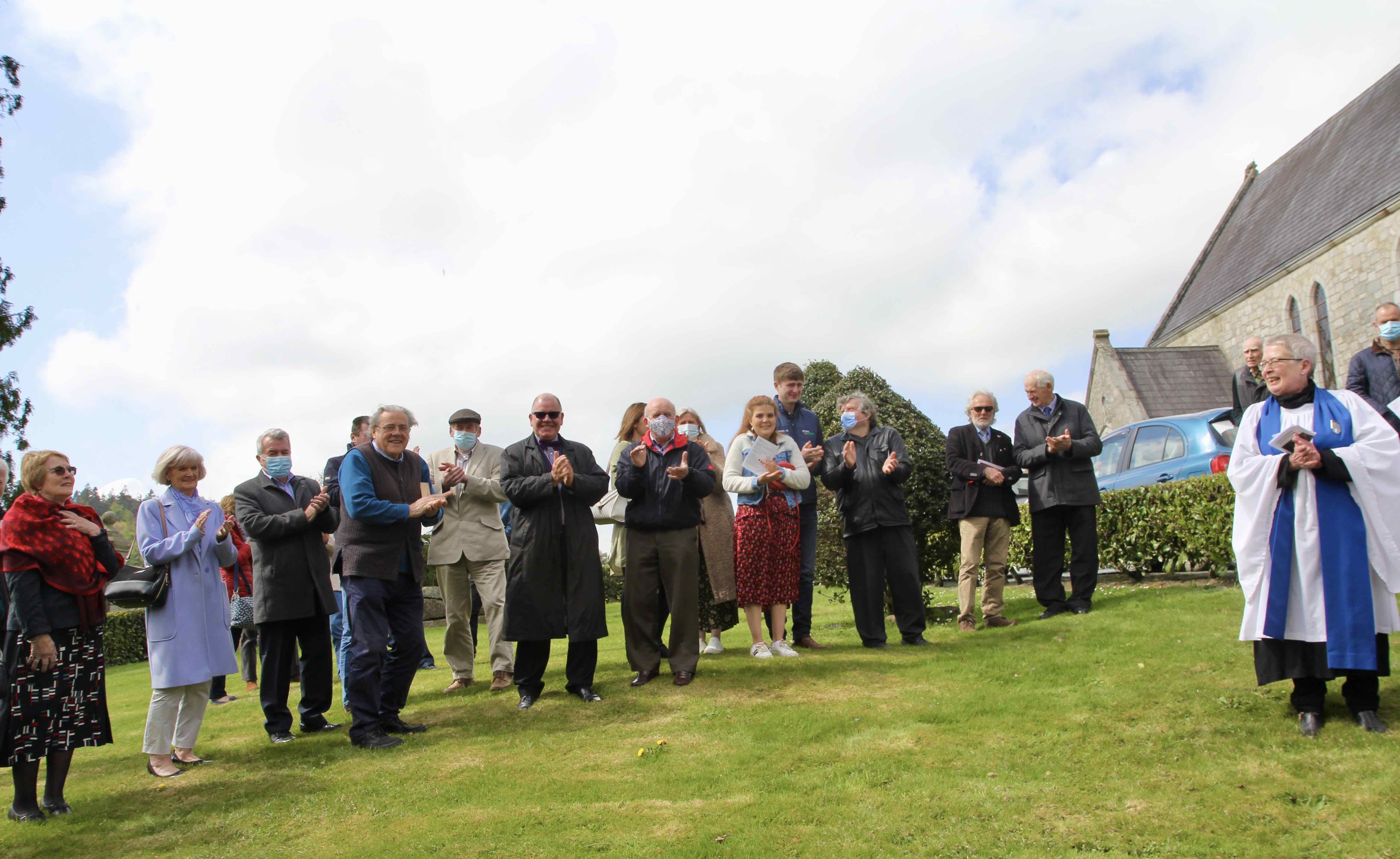 Parishioners of Castlemacadam, Ballinaclash and Augrim watch the tree planting to mark the 150th anniversary of Holy Trinity Church, Castlemacadam.