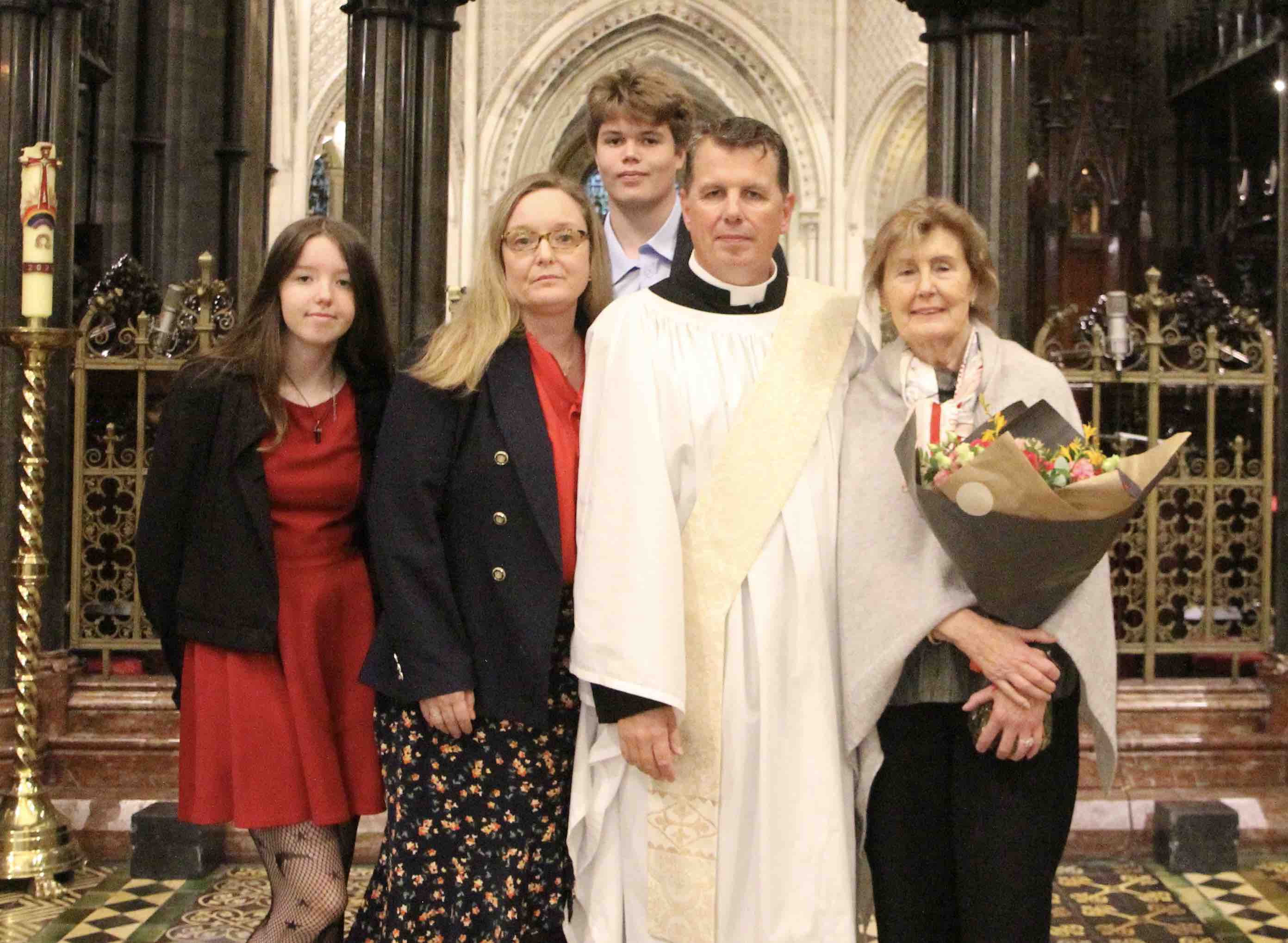 The Revd Mathew McCauley with his family.